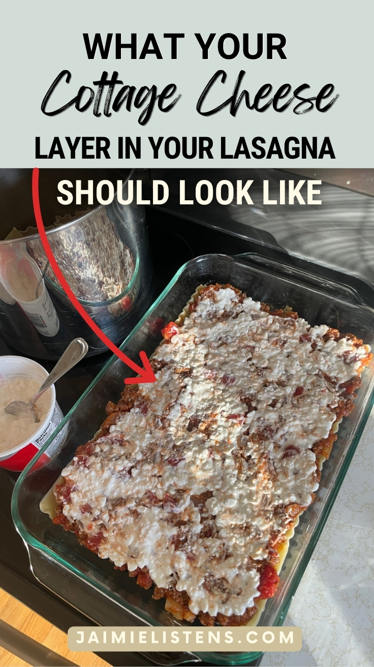 Cottage cheese spread across a layer of meat sauce in homemade lasagna recipe with cottage cheese.