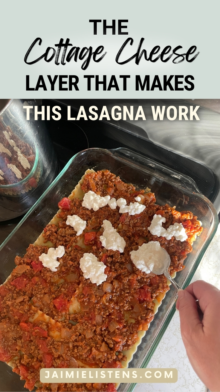 Cottage cheese dotted evenly over a lasagna layer before spreading it across the pan.