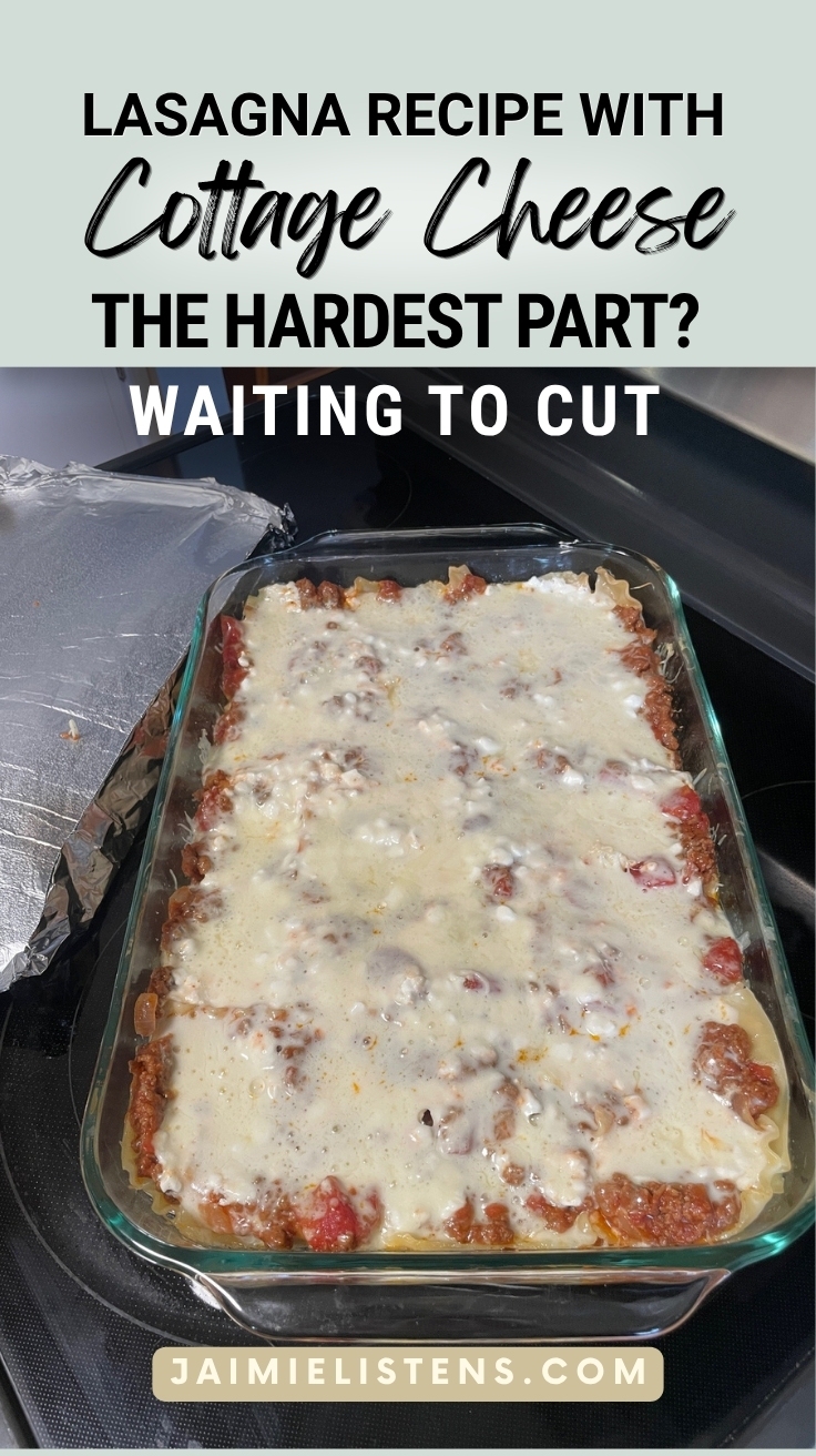 Freshly baked homemade lasagna recipe with cottage cheese cooling in a glass baking dish after baking.