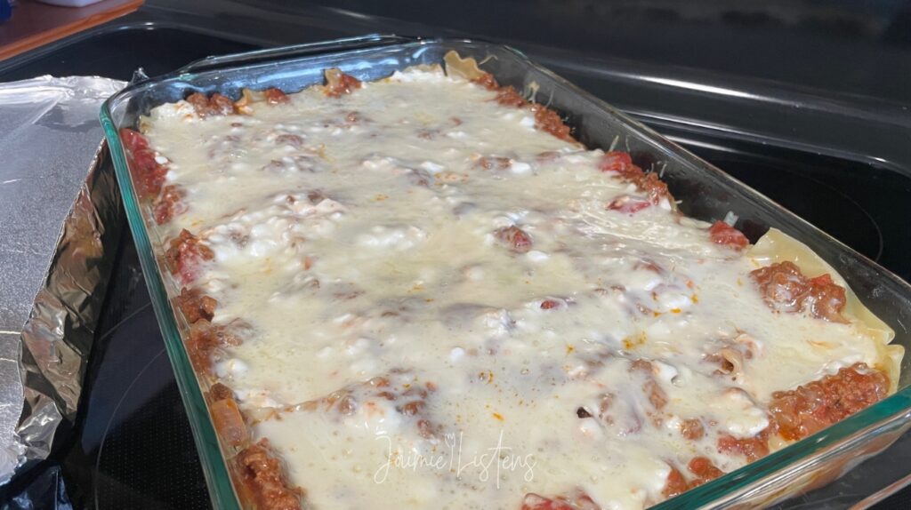 Homemade lasagna just pulled from the oven and uncovered.